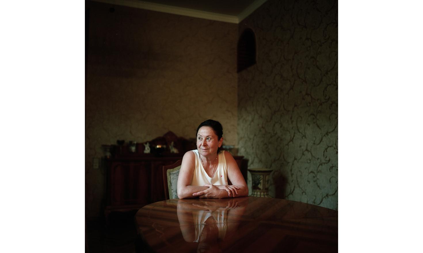 The wife of an ex-minister in her house of Sukhum(i)