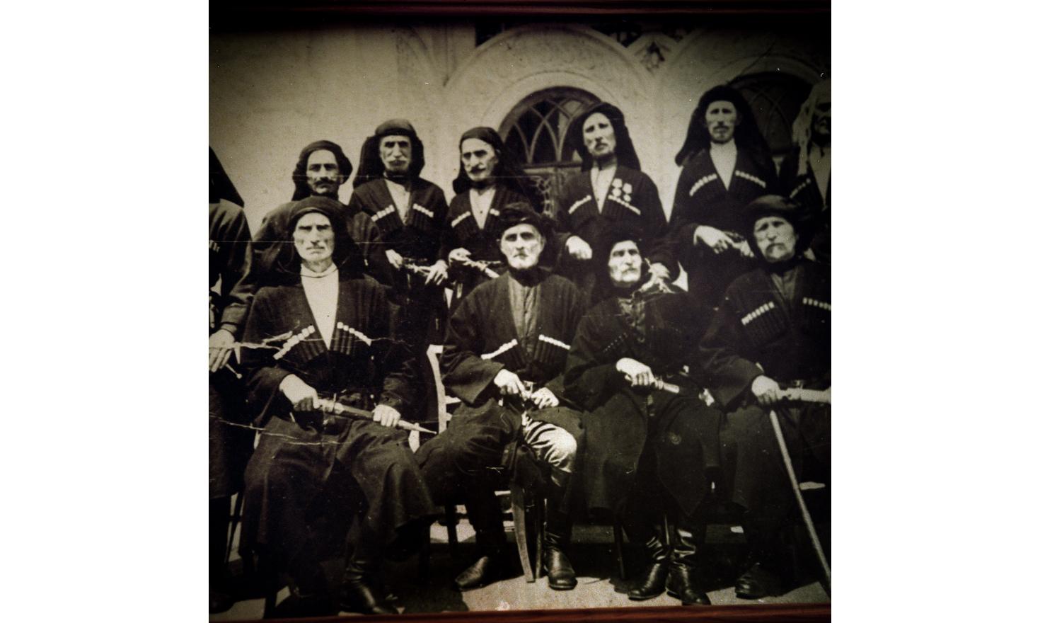 A detail of an old photo of a traditional Abkhaz family