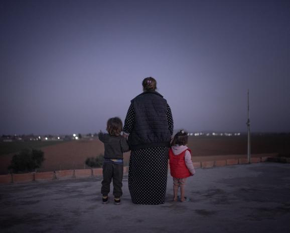 Jihane, 30 years old, and her two children from an ISIS father, are currently hiding in a safe house in Syria. 